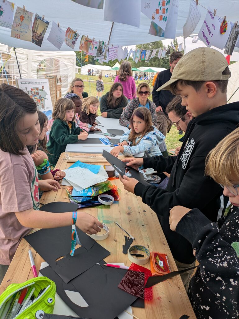 Louis leads a workshop at the trailblazer tent